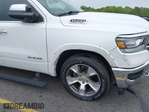 ✅ 2021 Ram 1500 Laramie • VIN: 1C6RREJT1MN709653 • Lot: 41951192. Listed on IAAI with 39,688 mi. Free auction sales archive from the USA and detailed vehicle history report at DreamBid. Image 6.