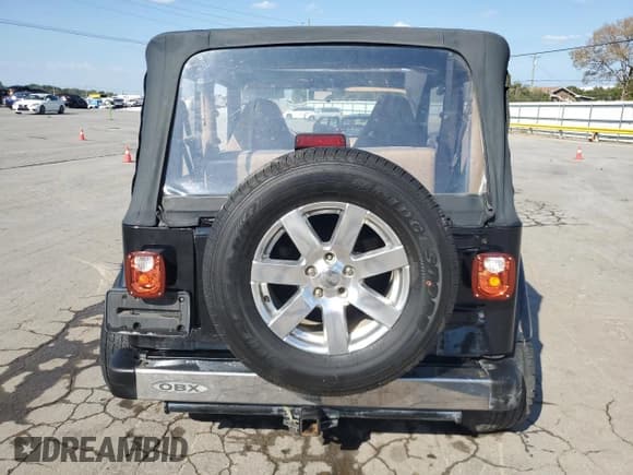 ✅ 2001 Jeep Wrangler Sahara • VIN: 1J4FA59S51P316375 • Lot: 85130815. Listed on Copart with 258,051 mi. Free auction sales archive from the USA and detailed vehicle history report at DreamBid. Image 6.