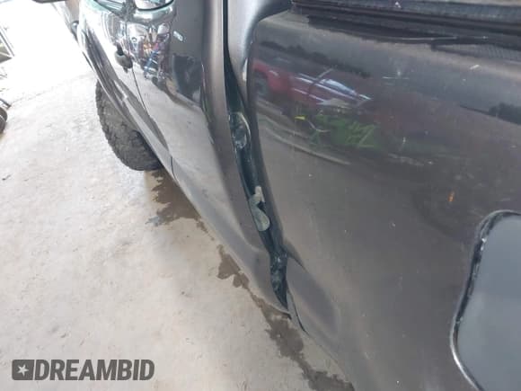 ✅ 2015 Toyota Tacoma • VIN: 5TFUX4EN8FX039993 • Lot: 39720722. Listed on IAAI with 107,085 mi. Free auction sales archive from the USA and detailed vehicle history report at DreamBid. Image 17.