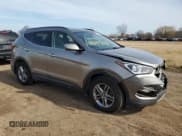 ✅ 2018 Hyundai Santa Fe 2.4L • VIN: 5NMZUDLB1JH067059 • Лот: 44322014. Опубликован ранее на Copart с пробегом 103 429 миль. Бесплатный доступ к архиву аукционных продаж из США и подробный отчёт об истории автомобиля на DreamBid. Изображение 4.