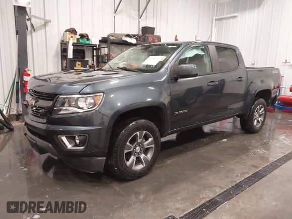 ✅ 2020 Chevrolet Colorado 4WD Z71 • VIN: 1GCGTDEN1L1163546 • Лот: 41706719. Опубликован ранее на IAAI с пробегом 64 662 миль. Бесплатный доступ к архиву аукционных продаж из США и подробный отчёт об истории автомобиля на DreamBid. Изображение 2.