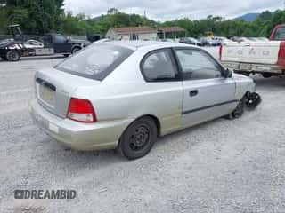 2002 Hyundai Accent z VIN KMHCF35G12U230303, wystawiony jako IAAI lot #42969384 z przebiegiem 137 565 mil mil oraz . Historia ofert i sprzedaży dostępna na DreamBid. Obrazek 4.