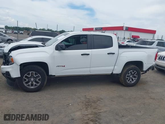 ✅ 2022 GMC Canyon 4WD AT4 • VIN: 1GTG6FEN6N1296521 • Лот: 42614319. Опубликован ранее на IAAI с пробегом 32 822 миль. Бесплатный доступ к архиву аукционных продаж из США и подробный отчёт об истории автомобиля на DreamBid. Изображение 14.