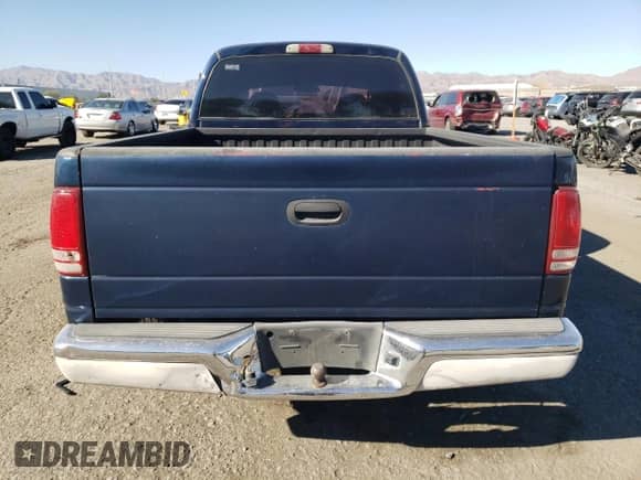 2004 Dodge Dakota SLT z VIN 1D7HL48N44S500485, wystawiony jako Copart lot #73153244 z przebiegiem Nie podano mil oraz Szkoda całkowita • Salvage title. Historia ofert i sprzedaży dostępna na DreamBid. Obrazek 6.