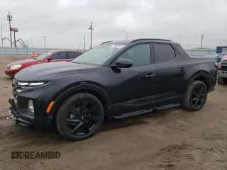 2023 Hyundai Santa Cruz Night Edition с VIN 5NTJCDAF4PH045429, выставлен на аукционе Copart как лот 77806794 с пробегом 12 240 миль миль и Списание • Salvage title. История ставок и продаж доступна на DreamBid. Изображение 1.