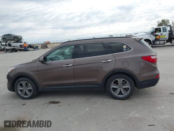 ✅ 2015 Hyundai Santa Fe GLS • VIN: KM8SMDHF4FU103061 • Лот: 43544205. Опубликован ранее на IAAI с пробегом 106 991 миль. Бесплатный доступ к архиву аукционных продаж из США и подробный отчёт об истории автомобиля на DreamBid. Изображение 15.