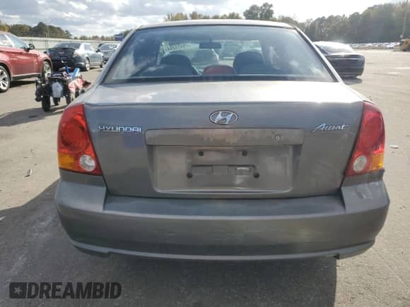 2003 Hyundai Accent GL with VIN KMHCG45C23U476391, listed as a Copart auction lot 78474264 with 155,731 mi miles and Salvage title. Bid and sale history available at DreamBid. Image 6.