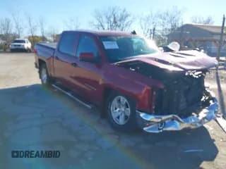 ✅ 2018 Chevrolet Silverado 1500 LT • VIN: 3GCUKREC3JG628151 • Lot: 43580470. Listed on IAAI with 39,884 mi. Free auction sales archive from the USA and detailed vehicle history report at DreamBid. Image 1.