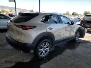 ✅ 2023 Mazda CX-30 S Premium • VIN: 3MVDMBDM1PM529493 • Lot: 64539914. Wystawiony na Copart z przebiegiem 23 691 mil. Bezpłatny archiwum sprzedaży aukcyjnych z USA i szczegółowy raport historii pojazdu na DreamBid. Zdjęcie 3.