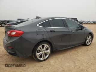 2017 Chevrolet Cruze Premier z VIN 1G1BF5SM5H7194699, wystawiony jako Copart lot #68640852 z przebiegiem 103 313 mil mil oraz . Historia ofert i sprzedaży dostępna na DreamBid. Obrazek 3.