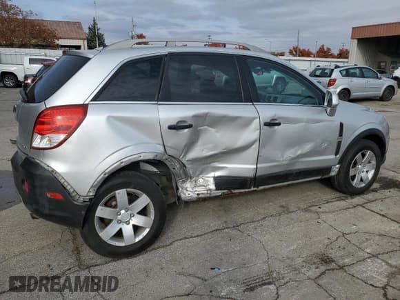 ✅ 2012 Chevrolet Captiva Sport LS • VIN: 3GNAL2EK1CS521640 • Lot: 77411864. Wystawiony na Copart z przebiegiem 142 731 mil. Bezpłatny archiwum sprzedaży aukcyjnych z USA i szczegółowy raport historii pojazdu na DreamBid. Zdjęcie 3.