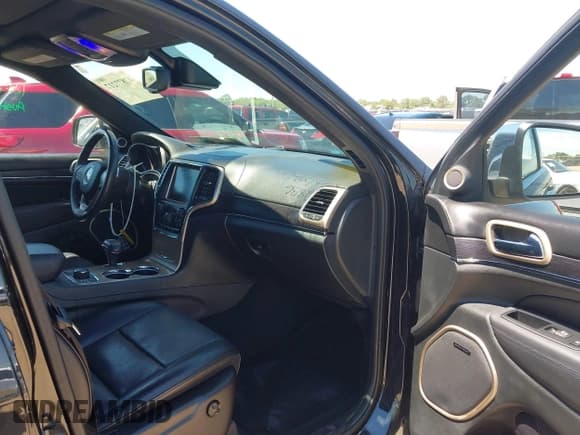 ✅ 2015 Jeep Grand Cherokee Summit • VIN: 1C4RJFJG2FC839884 • Lot: 42877217. Listed on IAAI with 98,458 mi. Free auction sales archive from the USA and detailed vehicle history report at DreamBid. Image 5.