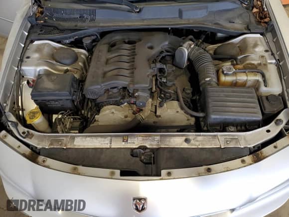 2010 Dodge Charger SXT с VIN 2B3CA3CV4AH231131, выставлен на аукционе Copart как лот 74116564 с пробегом Не указан миль и Списание • Salvage title. История ставок и продаж доступна на DreamBid. Изображение 11.