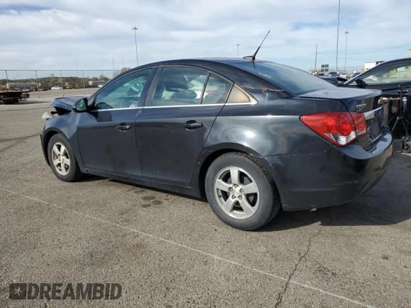 ✅ 2014 Chevrolet Cruze 1LT • VIN: 1G1PC5SB6E7345090 • Lot: 90121935. Listed on Copart with 167,599 mi. Free auction sales archive from the USA and detailed vehicle history report at DreamBid. Image 2.