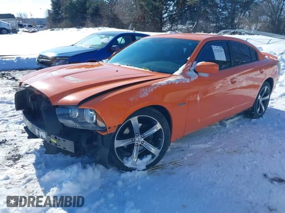 2014 Dodge Charger SXT with VIN 2C3CDXHG1EH219486, listed as a IAAI auction lot 41262265 with 117,949 mi miles and . Bid and sale history available at DreamBid. Image 2.