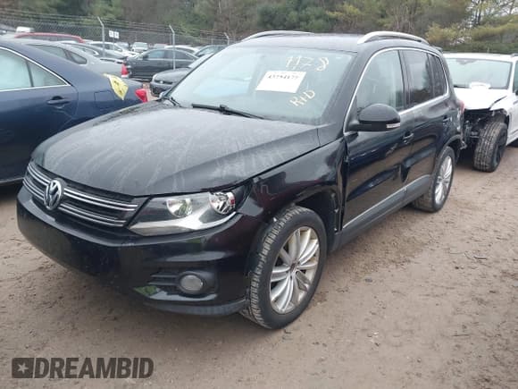 ✅ 2014 Volkswagen Tiguan S • VIN: WVGBV3AX5EW512425 • Lot: 43754178. Listed on IAAI with 157,539 mi. Free auction sales archive from the USA and detailed vehicle history report at DreamBid. Image 2.