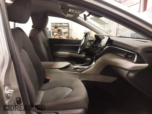 2021 Toyota Camry Hybrid LE with VIN 4T1C31AKXMU027792, listed as a IAAI auction lot 42012242 with 53,397 mi miles and . Bid and sale history available at DreamBid. Image 5.