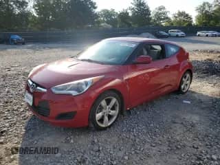 2013 Hyundai Veloster w/Gray Int z VIN KMHTC6ADXDU123842, wystawiony jako Copart lot #66178084 z przebiegiem 176 471 mil mil oraz Szkoda całkowita • Salvage title. Historia ofert i sprzedaży dostępna na DreamBid. Obrazek 1.