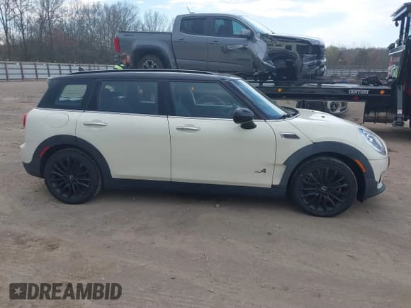 ✅ 2019 MINI Clubman Cooper • VIN: WMWLU1C56K2C42409 • Lot: 41908091. Listed on IAAI with 48,022 mi. Free auction sales archive from the USA and detailed vehicle history report at DreamBid. Image 13.