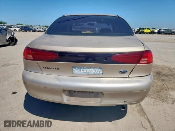 ✅ 1999 Ford Escort LX • VIN: 1FAFP10PXXW244941 • Lot: 66805705. Listed on Copart with 1,344,002 mi. Free auction sales archive from the USA and detailed vehicle history report at DreamBid. Image 6.