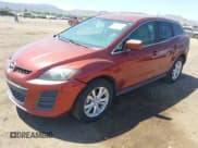 ✅ 2010 Mazda CX-7 Touring • VIN: JM3ER2W3XA0327040 • Лот: 42458408. Опубликован ранее на IAAI с пробегом 135 047 миль. Бесплатный доступ к архиву аукционных продаж из США и подробный отчёт об истории автомобиля на DreamBid. Изображение 2.