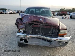✅ 2003 Dodge Dakota • VIN: 1D7HG42XX3S197550 • Lot: 79550024. Wystawiony na Copart z przebiegiem 70 997 mil. Bezpłatny archiwum sprzedaży aukcyjnych z USA i szczegółowy raport historii pojazdu na DreamBid. Zdjęcie 5.