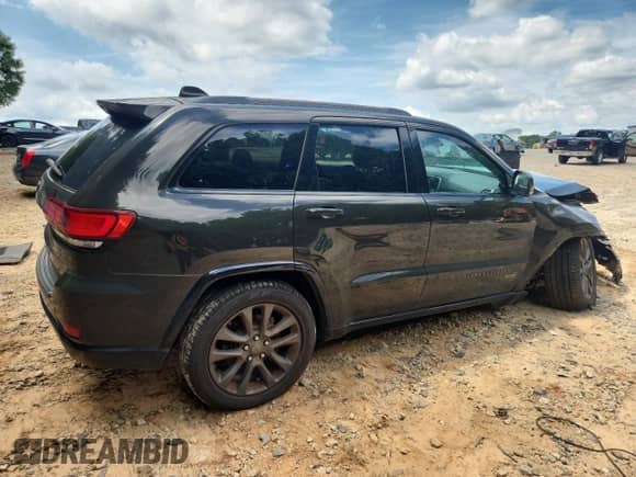 2016 Jeep Grand Cherokee Limited 75th Anniversary с VIN 1C4RJFBGXGC441631, выставлен на аукционе Copart как лот 62944015 с пробегом 118 502 миль миль и Списание • Salvage title. История ставок и продаж доступна на DreamBid. Изображение 3.