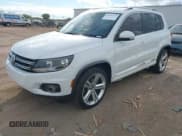 ✅ 2016 Volkswagen Tiguan S • VIN: WVGAV7AXXGW039479 • Lot: 43751575. Listed on IAAI with 164,449 mi. Free auction sales archive from the USA and detailed vehicle history report at DreamBid. Image 2.