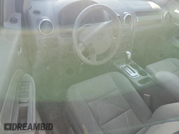 ✅ 2007 Ford Freestyle SEL • VIN: 1FMDK05177GA16884 • Lot: 71770444. Wystawiony na Copart z przebiegiem 219 112 mil. Bezpłatny archiwum sprzedaży aukcyjnych z USA i szczegółowy raport historii pojazdu na DreamBid. Zdjęcie 8.