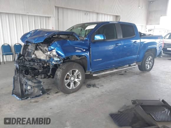 2018 Chevrolet Colorado 4WD Z71 z VIN 1GCGTDENXJ1155801, wystawiony jako IAAI lot #43394572 z przebiegiem 75 912 mil mil oraz . Historia ofert i sprzedaży dostępna na DreamBid. Obrazek 17.