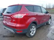 ✅ 2013 Ford Escape SE • VIN: 1FMCU9GX7DUD74897 • Lot: 43543524. Listed on IAAI with 143,979 mi. Free auction sales archive from the USA and detailed vehicle history report at DreamBid. Image 4.