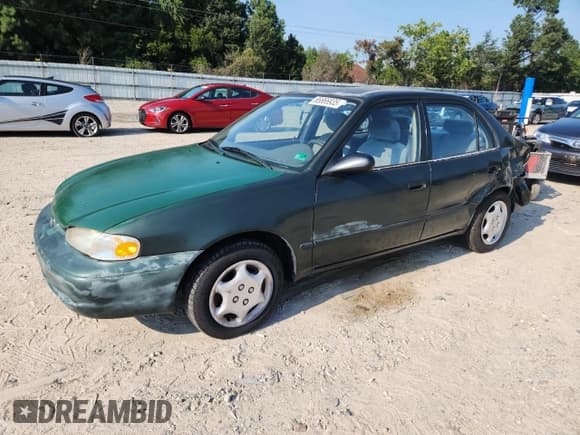✅ 2000 Chevrolet Prizm • VIN: 1Y1SK5284YZ411021 • Lot: 66666935. Listed on Copart with 137,188 mi. Free auction sales archive from the USA and detailed vehicle history report at DreamBid. Image 1.