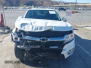 ✅ 2018 Chevrolet Colorado 2WD LT • VIN: 1GCGSCEA2J1123239 • Лот: 43417265. Опубликован ранее на IAAI с пробегом 78 414 миль. Бесплатный доступ к архиву аукционных продаж из США и подробный отчёт об истории автомобиля на DreamBid. Изображение 13.