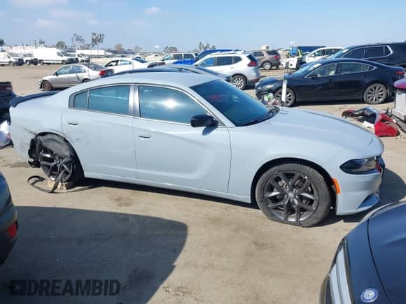 2021 Dodge Charger SXT with VIN 2C3CDXBG7MH507567, listed as a IAAI auction lot 43343265 with 53,576 mi miles and . Bid and sale history available at DreamBid. Image 13.