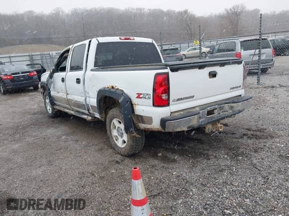 2004 Chevrolet Silverado 1500 Z71 with VIN 2GCEK13T741427729, listed as a IAAI auction lot 41238310 with 151,978 mi miles and . Bid and sale history available at DreamBid. Image 3.