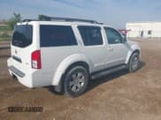 ✅ 2005 Nissan Pathfinder XE • VIN: 5N1AR18W05C762321 • Lot: 42714252. Listed on IAAI with 149,335 mi. Free auction sales archive from the USA and detailed vehicle history report at DreamBid. Image 4.