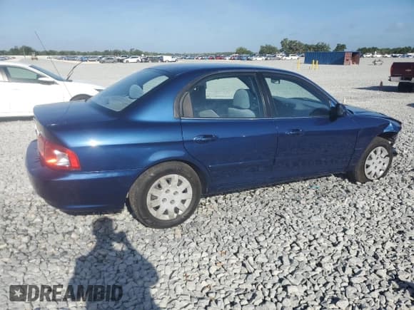 ✅ 2005 Kia Optima LX • VIN: KNAGD126X55391241 • Лот: 51785805. Опубликован ранее на Copart с пробегом 60 785 миль. Бесплатный доступ к архиву аукционных продаж из США и подробный отчёт об истории автомобиля на DreamBid. Изображение 3.