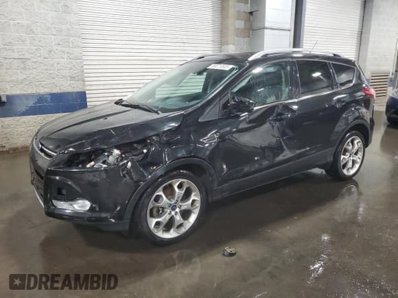 ✅ 2015 Ford Escape Titanium • VIN: 1FMCU9J90FUC25986 • Lot: 89878505. Listed on Copart with 127,376 mi. Free auction sales archive from the USA and detailed vehicle history report at DreamBid. Image 1.