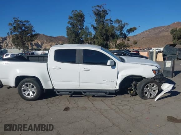 ✅ 2022 Chevrolet Colorado 4WD LT • VIN: 1GCGTCEN4N1302341 • Lot: 43448645. Listed on IAAI with 111,881 mi. Free auction sales archive from the USA and detailed vehicle history report at DreamBid. Image 13.