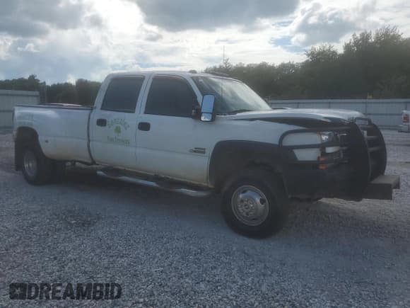 ✅ 2004 Chevrolet Silverado 3500 DRW • VIN: 1GCJK33184F162739 • Lot: 69071594. Listed on Copart with 242,619 mi. Free auction sales archive from the USA and detailed vehicle history report at DreamBid. Image 4.