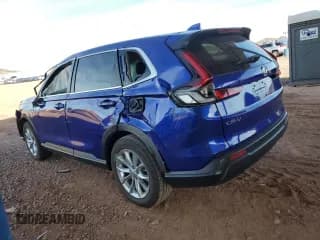 ✅ 2025 Honda CR-V EX-L • VIN: 2HKRS4H77SH444055 • Лот: 93310885. Опубликован ранее на Copart с пробегом 13 058 миль. Бесплатный доступ к архиву аукционных продаж из США и подробный отчёт об истории автомобиля на DreamBid. Изображение 2.