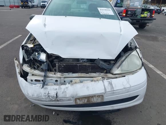 ✅ 2000 Ford Focus LX • VIN: 1FAFP33P8YW152574 • Lot: 43578214. Listed on IAAI with 175,420 mi. Free auction sales archive from the USA and detailed vehicle history report at DreamBid. Image 12.