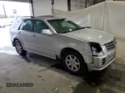 ✅ 2004 Cadillac SRX • VIN: 1GYDE637440141409 • Lot: 82288895. Listed on Copart with 217,209 mi. Free auction sales archive from the USA and detailed vehicle history report at DreamBid. Image 4.