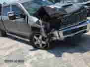 2017 Chevrolet Silverado 2500HD LTZ с VIN 1GC1KWEY4HF156440, выставлен на аукционе Copart как лот 71732905 с пробегом 180 327 миль миль и Списание • Salvage title. История ставок и продаж доступна на DreamBid. Изображение 13.