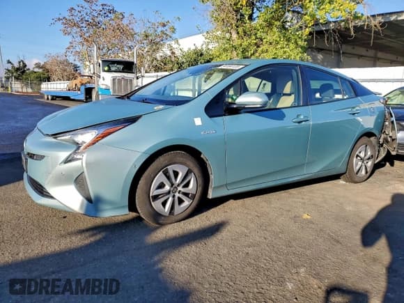 ✅ 2017 Toyota Prius Two • VIN: JTDKBRFU3H3042870 • Lot: 94104135. Listed on Copart with 90,689 mi. Free auction sales archive from the USA and detailed vehicle history report at DreamBid. Image 1.