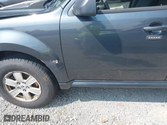 2010 Mercury Mariner z VIN 4M2CN8B79AKJ28843, wystawiony jako IAAI lot #40099437 z przebiegiem 203 467 mil mil oraz . Historia ofert i sprzedaży dostępna na DreamBid. Obrazek 14.