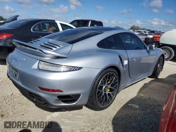 ✅ 2015 Porsche 911 Turbo S • VIN: WP0AD2A97FS166675 • Lot: 74341894. Wystawiony na Copart z przebiegiem Nie podano. Bezpłatny archiwum sprzedaży aukcyjnych z USA i szczegółowy raport historii pojazdu na DreamBid. Zdjęcie 3.