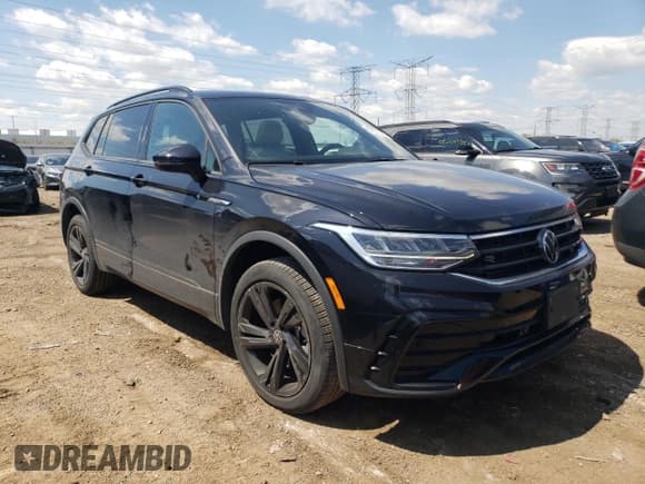 ✅ 2023 Volkswagen Tiguan SE R-Line Black • VIN: 3VV8B7AXXPM071863 • Лот: 55653325. Опубликован ранее на Copart с пробегом 12 054 миль. Бесплатный доступ к архиву аукционных продаж из США и подробный отчёт об истории автомобиля на DreamBid. Изображение 4.