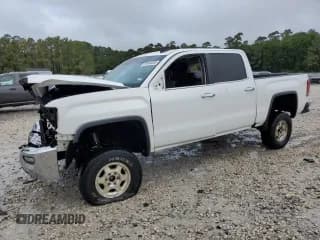 ✅ 2018 GMC Sierra 1500 SLT • VIN: 3GTU2NEC0JG210512 • Lot: 53464305. Listed on Copart with 142,271 mi. Free auction sales archive from the USA and detailed vehicle history report at DreamBid. Image 1.