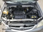 ✅ 2001 Mazda Tribute LX • VIN: 4F2CU08171KM64973 • Lot: 67452495. Listed on Copart with 160,864 mi. Free auction sales archive from the USA and detailed vehicle history report at DreamBid. Image 12.